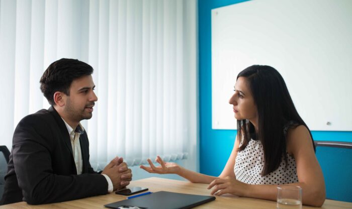 serious-businesswoman-businessman-talking-boardroom (1) serious-businesswoman-businessman-talking-boardroom (1)